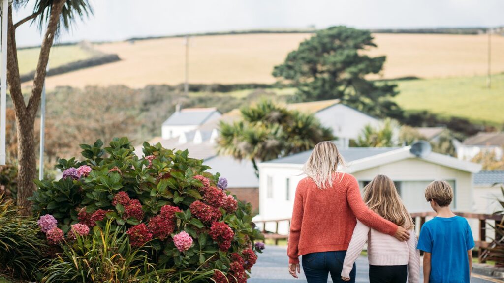 Family walking through a scenic area Newquay Bay Holiday Resort