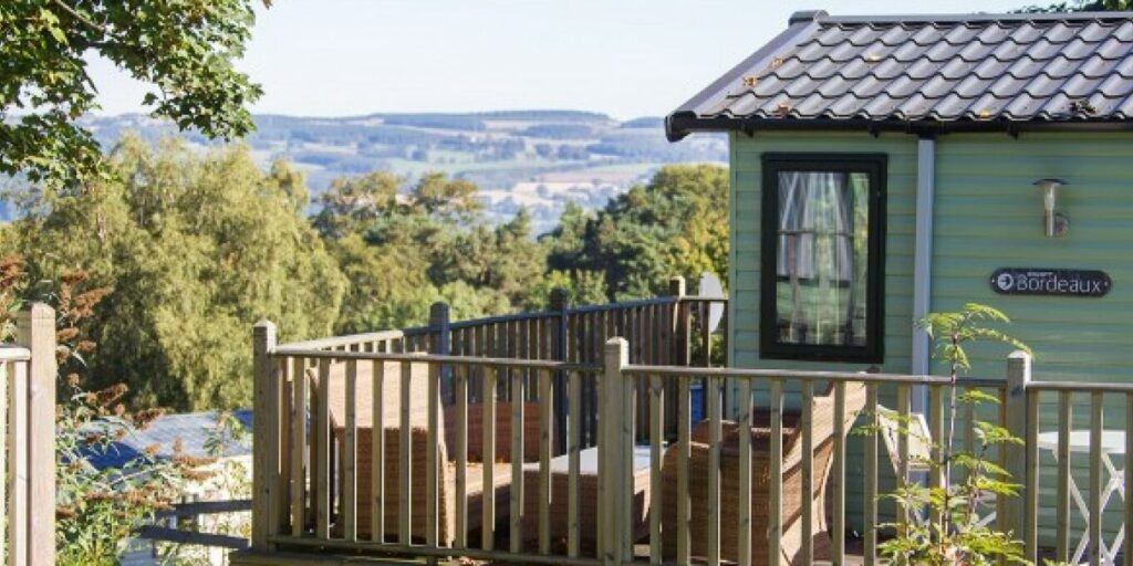 Causey Hill Holiday Parks caravan with a view of the sea and hills