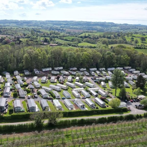 rows of caravans on a field in a caravan park Worcestershire discover knighton on teme caravan park