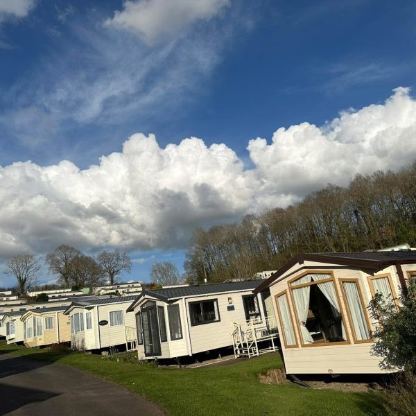 Caravans under a cloudy sky