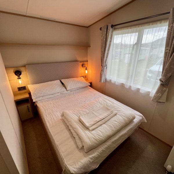 Cozy bedroom with natural light.