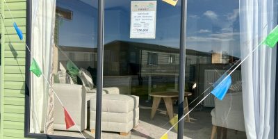 Swift Moselle for sale front of caravan with flags