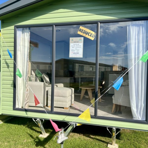 Swift Moselle for sale front of caravan with flags