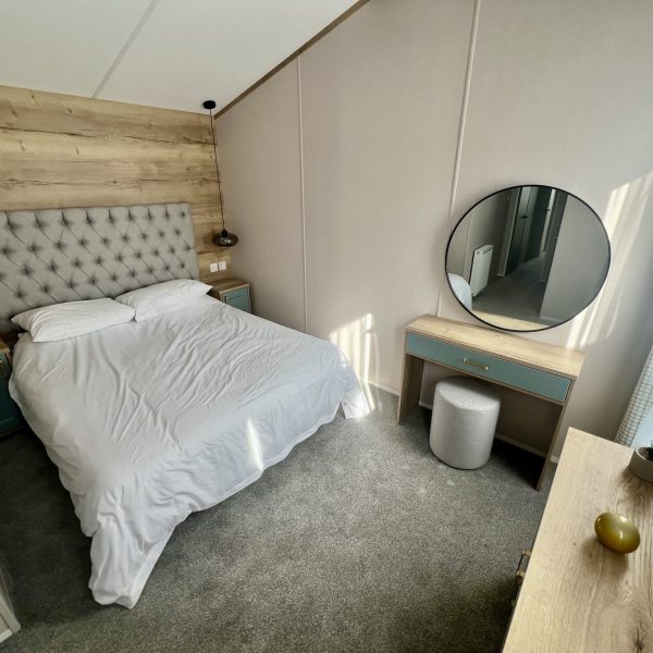 Modern bedroom with neutral decor.