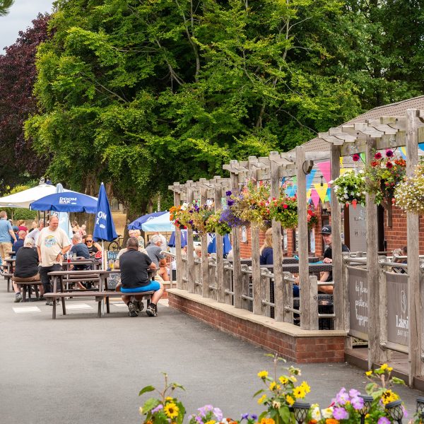 Outdoor dining area with vibrant decorations.