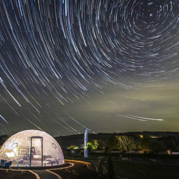 Star trails above a geodesic dome