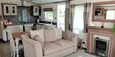 Cozy living room with kitchen area.