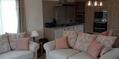 Modern living room with kitchen area