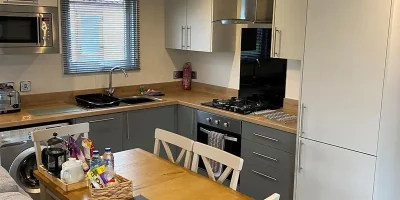 Modern kitchen with dining area.