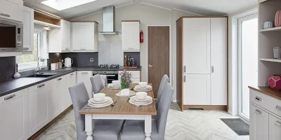 Modern kitchen with dining area.