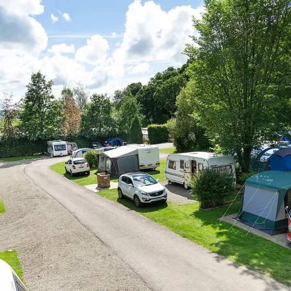 Campsite with caravans and tents.