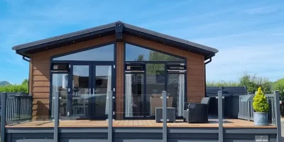 Modern cabin with large windows and deck